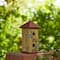 Glitzhome® 11.75" Yellow Washed 3D Metal Flowers Distressed Wood Cottage Birdhouse